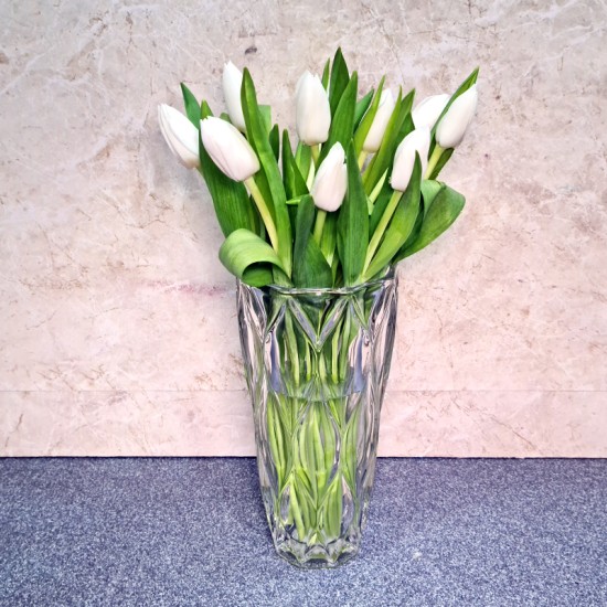 crystal vase with ten white tulips crystal vase with ten white tulips