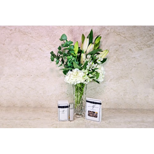 Crystal Vase with Lilies and Gifts